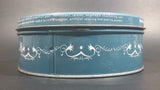 Vintage Shirley Jean Fruit Cake Embossed Cameo Style Decorative Blue and White Sweets Tin - Treasure Valley Antiques & Collectibles