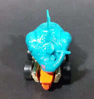 1998 Hot Wheels Speed-A-Saurus Stegosaurus Dinosaur Blue Turquoise Die Cast Toy Car Vehicle - Treasure Valley Antiques & Collectibles