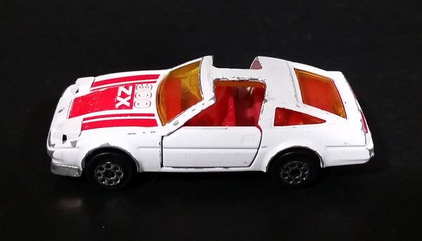 Vintage Majorette Nissan 300 ZX Turbo T-Top No. 241 White with Opening Doors and Moving Headlights 1/62 Scale Made in France - Treasure Valley Antiques & Collectibles