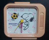 Vintage 1958 Citizen United Feature Syndicate Snoopy Playing Soccer Pink Alarm Clock Collectible - Treasure Valley Antiques & Collectibles