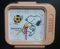 Vintage 1958 Citizen United Feature Syndicate Snoopy Playing Soccer Pink Alarm Clock Collectible - Treasure Valley Antiques & Collectibles