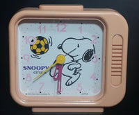 Vintage 1958 Citizen United Feature Syndicate Snoopy Playing Soccer Pink Alarm Clock Collectible - Treasure Valley Antiques & Collectibles