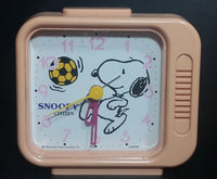 Vintage 1958 Citizen United Feature Syndicate Snoopy Playing Soccer Pink Alarm Clock Collectible - Treasure Valley Antiques & Collectibles