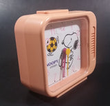 Vintage 1958 Citizen United Feature Syndicate Snoopy Playing Soccer Pink Alarm Clock Collectible - Treasure Valley Antiques & Collectibles