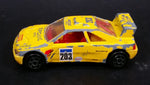 Vintage Majorette Peugeot 405 T 16 Yellow No. 202 with Esso and Michelin Logos 1/60 Scale Die Cast Toy Car Vehicle Made in France - Treasure Valley Antiques & Collectibles