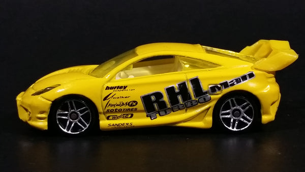 2001 Hot Wheels Toyota Celica "RHLman Turbo" Yellow Die Cast Toy Race Car Vehicle - Treasure Valley Antiques & Collectibles