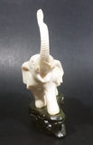 Vintage White Ivory Look Plastic Elephant on Rock Looking Stand with Trunk Up Made in Hong Kong - Treasure Valley Antiques & Collectibles