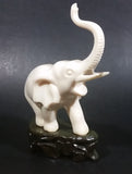 Vintage White Ivory Look Plastic Elephant on Rock Looking Stand with Trunk Up Made in Hong Kong - Treasure Valley Antiques & Collectibles