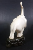 Vintage White Ivory Look Plastic Elephant on Rock Looking Stand with Trunk Up Made in Hong Kong - Treasure Valley Antiques & Collectibles