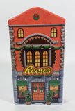 Collectible Reese's Peanut Butter Cups Reese's Pieces Orange Christmas Holiday Toy Store Themed Orange Chocolate Tin - Treasure Valley Antiques & Collectibles