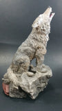 1999 Wolf Howling While Sitting on a Rock 10" Tall Decorative Resin Sculpture - Treasure Valley Antiques & Collectibles
