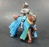 1997 Britains Die Cast Jousting Medieval Knight on Blue Draped Brown Horse Figure - Jousting stick broken off - Treasure Valley Antiques & Collectibles