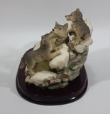 1987 Crosa The Canadian Rockies Wolf Pups Wolves Sitting and Playing Near Frozen Water Falls on Snow Covered Rocks Resin Sculpture Wildlife Collectible - Treasure Valley Antiques & Collectibles