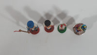 Three Small Christmas Nutcracker Figures and One Bottle Cork Nutcracker