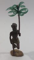 Man Holding a Palm Tree Umbrella While Standing on One Foot Resin and Plastic Figurine