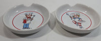 Set of 2 1993 Westwood Campbell's Soup Kids Boy and Girl Children Design Good Ceramic Spoon Rest Holder