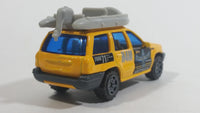 1999 Matchbox Jeep Grand Cherokee Yellow with Grey Raft Die Cast Toy Car Vehicle