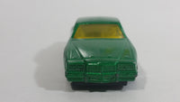 2010 Hot Wheels Race World Movie Stunts '84 Pontiac Grand Prix Metallic Green Die Cast Toy Car Vehicle