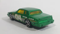 2010 Hot Wheels Race World Movie Stunts '84 Pontiac Grand Prix Metallic Green Die Cast Toy Car Vehicle