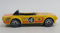 2011 Hot Wheels Track Stars Triumph TR6 Yellow #4 Die Cast Toy Race Car Vehicle