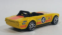 2011 Hot Wheels Track Stars Triumph TR6 Yellow #4 Die Cast Toy Race Car Vehicle