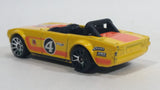 2011 Hot Wheels Track Stars Triumph TR6 Yellow #4 Die Cast Toy Race Car Vehicle