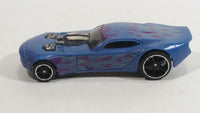 2014 Hot Wheels Stunt 'N Dunk Color Changers Nitro Door Slammer Aston Martin Blue and Purple Die Cast Toy Race Car Vehicle