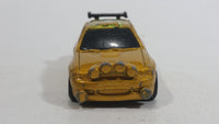 2003 Hot Wheels Flamin' Ford Escort Rally #5 Gold Die Cast Toy Car Vehicle