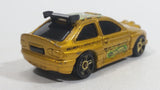 2003 Hot Wheels Flamin' Ford Escort Rally #5 Gold Die Cast Toy Car Vehicle