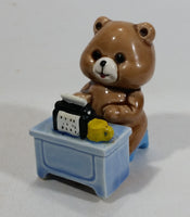 Cute Brown Bear Typing on Black Typewriter While Sitting At A Blue Desk Ceramic Figurine Made in Japan