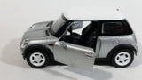 New Ray Mini Cooper Grey Silver Die Cast 1/43 Scale Pull Back Friction Motorized Toy Car Vehicle with Opening Doors - Damage to Drivers Side Headlight