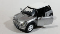 New Ray Mini Cooper Grey Silver Die Cast 1/43 Scale Pull Back Friction Motorized Toy Car Vehicle with Opening Doors - Damage to Drivers Side Headlight