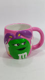 2003 Effem The Jelly Bean Factory M & M's Chocolate Candy Coated Snacks Hand Painted Pink Ceramic Coffee Mug with Green Character