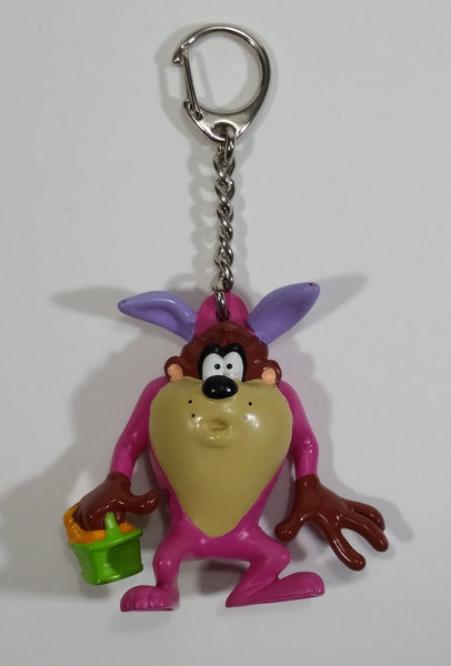 WBEI Warner Bros Looney Tunes Taz Wearing a Pink Easter Bunny Costume with Green Basket PVC Figurine Keychain Cartoon Collectible