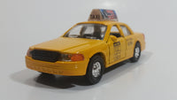 Shing Fat Welcome to N.Y.C. Yellow Taxi Cab Pullback Friction Motorized Die Cast Toy Car Vehicle with Opening Doors 1/40 Scale