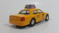 Shing Fat Welcome to N.Y.C. Yellow Taxi Cab Pullback Friction Motorized Die Cast Toy Car Vehicle with Opening Doors 1/40 Scale