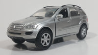 New Ray 2006 Mercedes-Benz M-Class Silver 1/32 Scale Die Cast Toy Car Sport Utility Vehicle with Opening Doors