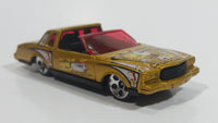 2002 Hot Wheels Trump Cars Montezooma Metalflake gold Die Cast Toy Car Vehicle