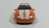 Motor Max Toyota Supra Orange and White No. 6012 Die Cast Toy Car Vehicle