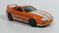 Motor Max Toyota Supra Orange and White No. 6012 Die Cast Toy Car Vehicle