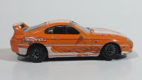 Motor Max Toyota Supra Orange and White No. 6012 Die Cast Toy Car Vehicle