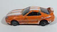 Motor Max Toyota Supra Orange and White No. 6012 Die Cast Toy Car Vehicle