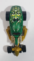 2004 Hot Wheels Demonition 1/4 Mile Coupe Green and Gold Die Cast Toy Car Vehicle