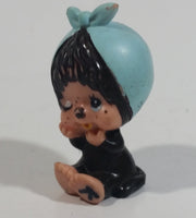 Vintage 1979 Sekiguchi Monchichi Girl Sitting with Blue Bonnet Head Scarf 2" Tall PVC Toy Figure