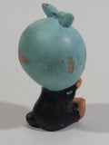 Vintage 1979 Sekiguchi Monchichi Girl Sitting with Blue Bonnet Head Scarf 2" Tall PVC Toy Figure