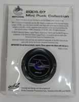 2006 - 07 The Province Time Colonist NHL Ice Hockey Mini Puck Collection Vancouver Canucks Mattias Ohlund New sealed in Package