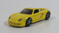 2009 Hot Wheels Dream Garage Porsche Carrera GT Yellow Die Cast Toy Car Vehicle