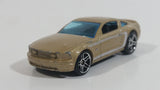 2007 Hot Wheels 2005 Ford Mustang GT Champagne Gold Die Cast Toy Car Vehicle