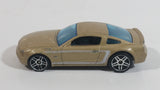 2007 Hot Wheels 2005 Ford Mustang GT Champagne Gold Die Cast Toy Car Vehicle