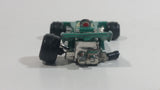 Vintage TinToys Tyrrell Ford F1 #7 W.T. 225 Green STP Die Cast Toy Race Car Vehicle - Hong Kong - Missing a Wheel